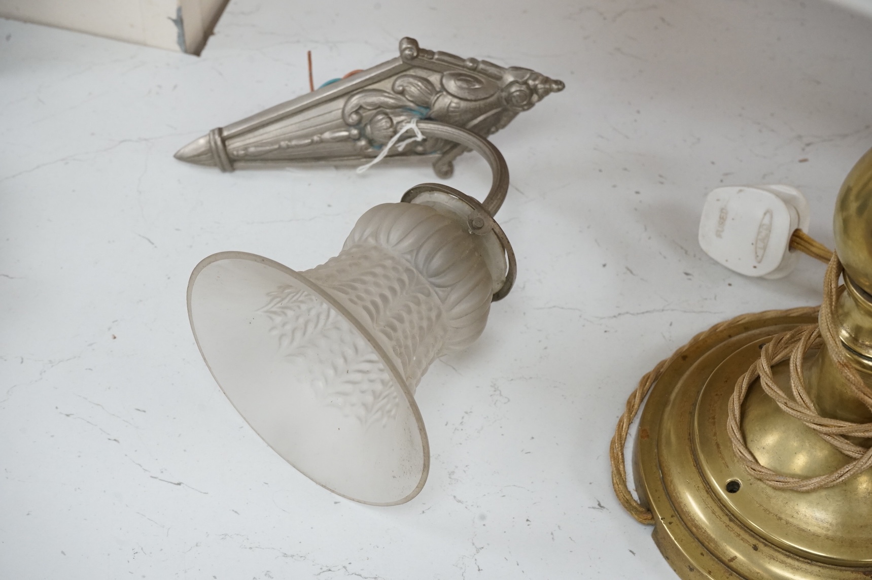 A brass table lamp and a chrome Art Deco style wall light, both with glass shades, lamp 58cm high